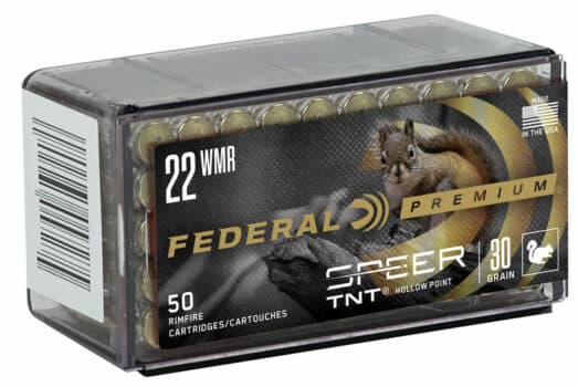 Pack of Federal Premium .22 WMR hollow point ammunition, featuring 50 rimfire cartridges in a clear plastic box.